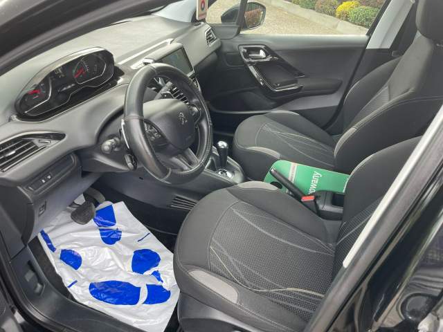 Peugeot 208 I 2013 — zdjęcie 21