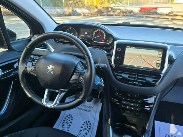 Peugeot 208 I 2013 — zdjęcie 19