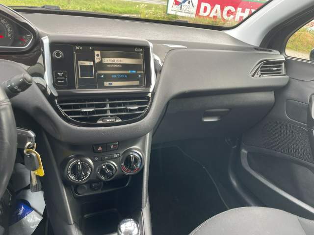 Peugeot 208 I 2013 — zdjęcie 20