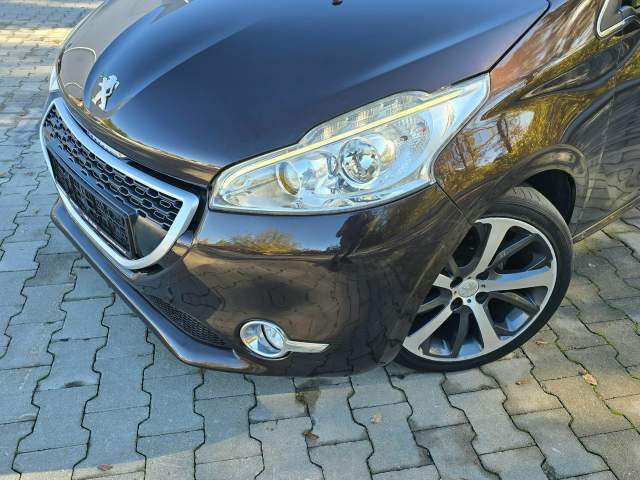 Peugeot 208 I 2013 — zdjęcie 12