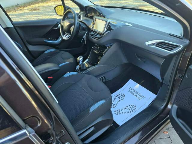 Peugeot 208 I 2013 — zdjęcie 16